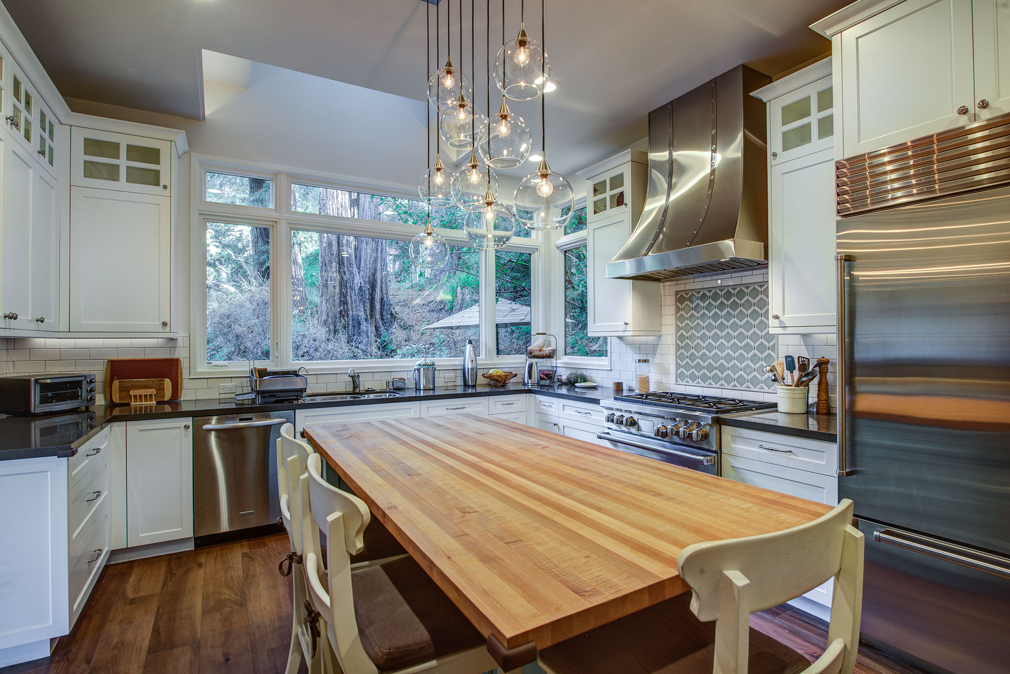 Berkeley-Hills-Craftsman-Renewal Kitchen island to windows