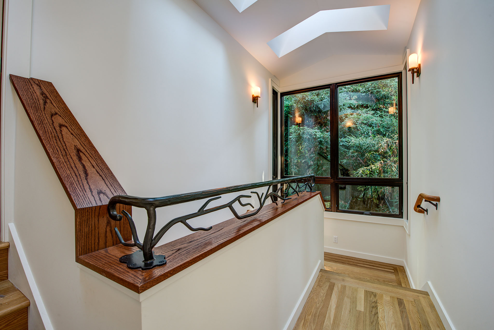 Berkeley-Hills-Craftsman-Renewal stair railing detail to windows