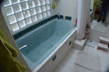 Lighthearted Bath before blue tub